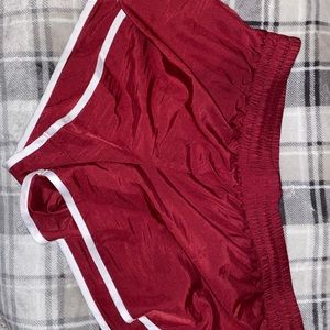 large maroon athletic shorts
